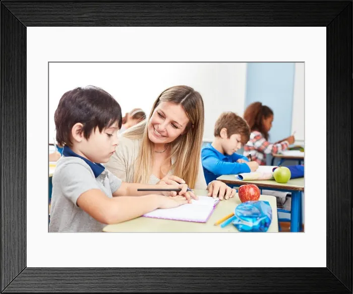 Framed Print : Homework student mentoring with a teacher in a full-time school Framed Print : Homework student mentoring with a teacher in a full-time school