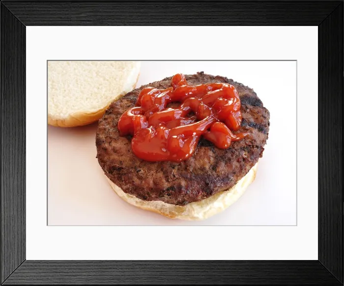 Framed Print : Grilled Hamburger with tomato sauce / Catsup / Ketchup on a bun / bap Framed Print : Grilled Hamburger with tomato sauce / Catsup / Ketchup on a bun / bap