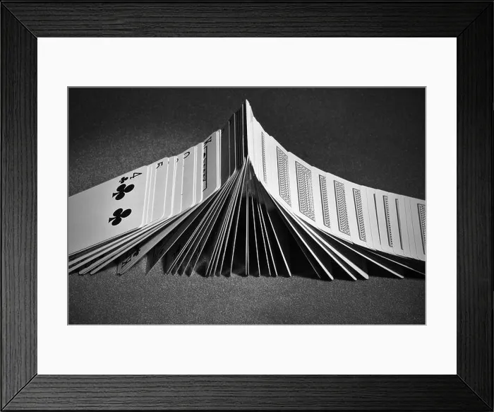 Framed Print : Poker playing cards turning face-up sequentially like dominoes. Casino and Card Magic maneuver Framed Print : Poker playing cards turning face-up sequentially like dominoes. Casino and Card Magic maneuver