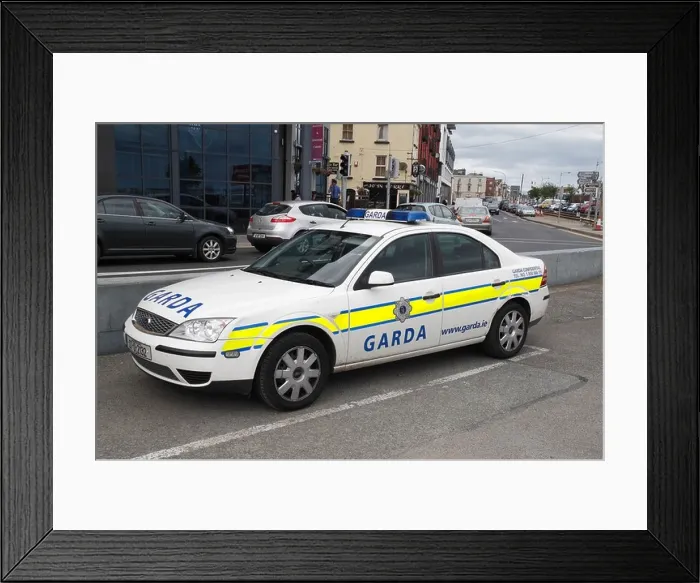 Framed Print : An Irish Garda (Police) car parked beside the coastal road in Wexford Town, Co. Wexford, Ireland (Eire) Framed Print : An Irish Garda (Police) car parked beside the coastal road in Wexford Town, Co. Wexford, Ireland (Eire)