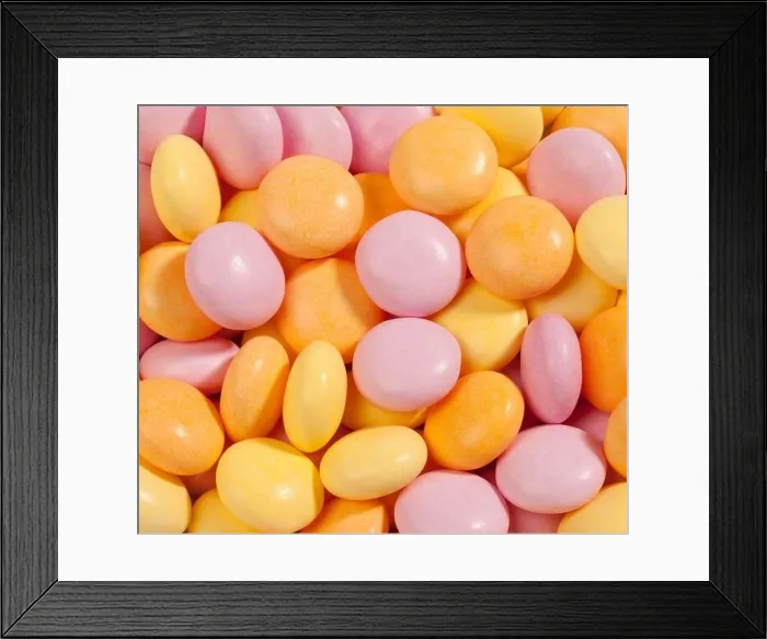 Framed Print : Mentos candy in orange pink and yellow Framed Print : Mentos candy in orange pink and yellow