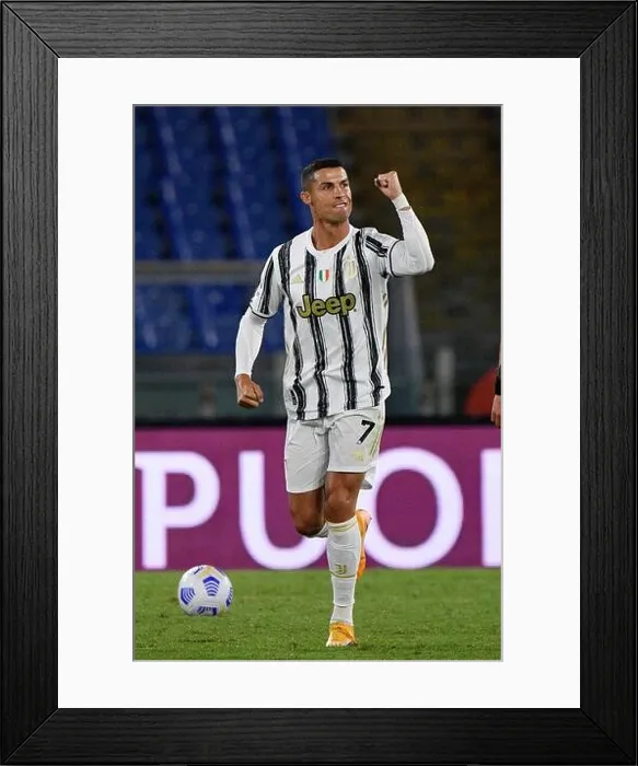 Framed Print : Cristiano Rolando of Juventus seen in action during the Italian Football Championship League A 2020 / 2021 match between AS Roma vs FC Juventus Framed Print : Cristiano Rolando of Juventus seen in action during the Italian Football Championship League A 2020 / 2021 match between AS Roma vs FC Juventus