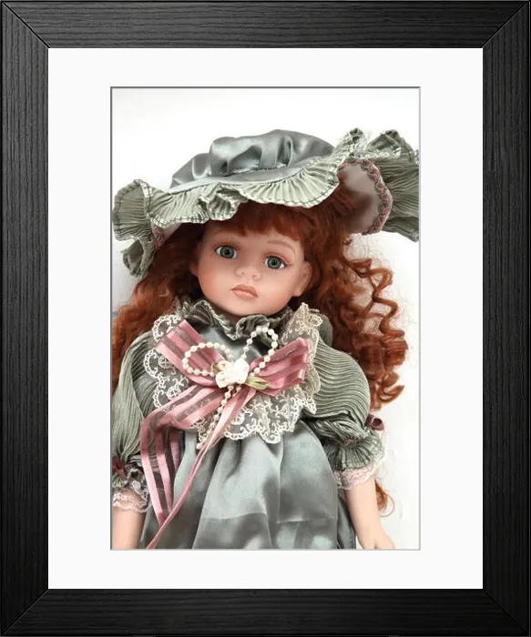Framed Print : A Modern Replica of a Victorian Porcelain Doll with Red Hair Framed Print : A Modern Replica of a Victorian Porcelain Doll with Red Hair
