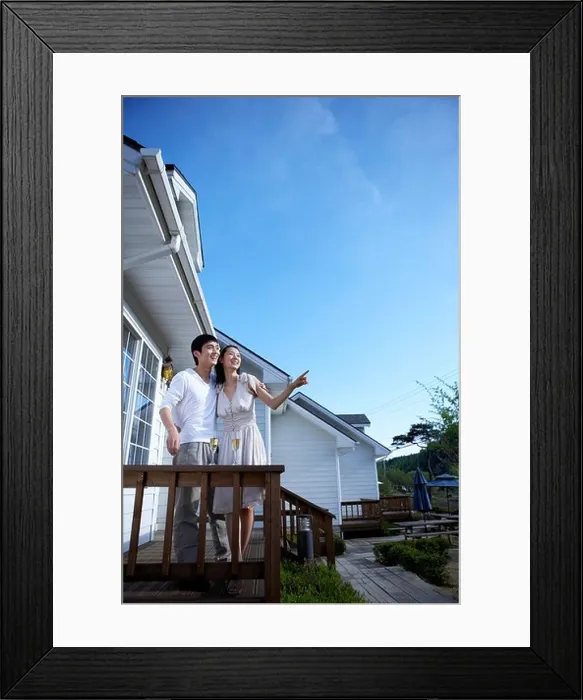 Framed Print : couple looking out in the balcony Framed Print : couple looking out in the balcony