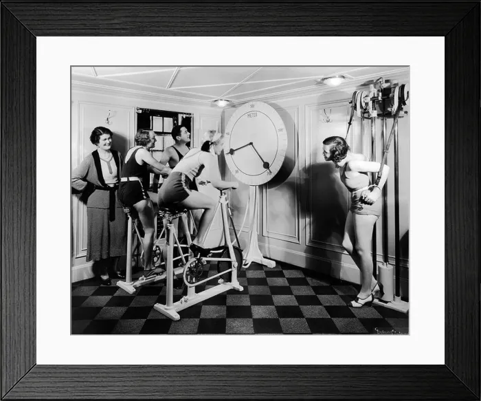 Framed Print : 1920s GROUP 4 WOMEN ONE MAN IN EXERCISE GYM LOOKING AT CLOCK Framed Print : 1920s GROUP 4 WOMEN ONE MAN IN EXERCISE GYM LOOKING AT CLOCK