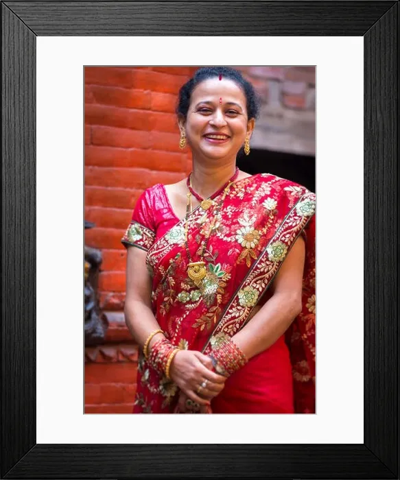 Framed Print : Woman dressed in a red traditional indian dress for a wedding in Nepal Framed Print : Woman dressed in a red traditional indian dress for a wedding in Nepal