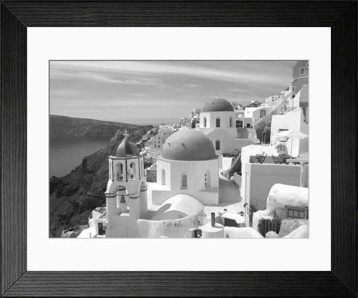 Framed Print : Greek Islands style architecture of Oia village, Santorini island, Greece in Monochrome Framed Print : Greek Islands style architecture of Oia village, Santorini island, Greece in Monochrome