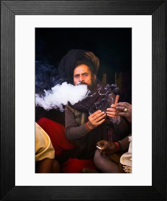 Framed Print : Sadhu smoking a chilam in Kumbha Mela, Allahabad, Uttar Pradesh, India Framed Print : Sadhu smoking a chilam in Kumbha Mela, Allahabad, Uttar Pradesh, India