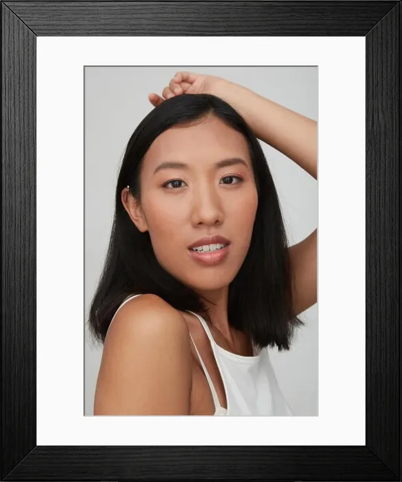 Framed Print : Portrait of young female Chinese woman, hand on head
