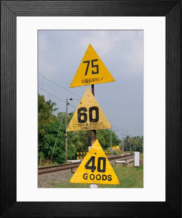 Framed Print : Railway sign board regarding speed limit for various Trains including passenger, goods train etc Framed Print : Railway sign board regarding speed limit for various Trains including passenger, goods train etc