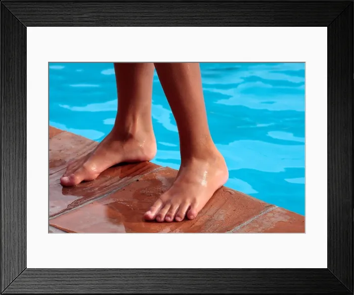 Framed Print : Boy's feet by a swimming pool Framed Print : Boy's feet by a swimming pool