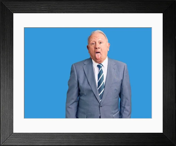 Framed Print : Senior handsome grey-haired man wearing elegant suit sticking tongue out happy with funny expression. emotion concept Framed Print : Senior handsome grey-haired man wearing elegant suit sticking tongue out happy with funny expression. emotion concept