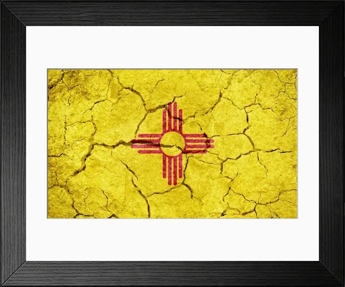 Framed Print : Flag of the U.S. state of New Mexico on dry earth ground texture background Framed Print : Flag of the U.S. state of New Mexico on dry earth ground texture background