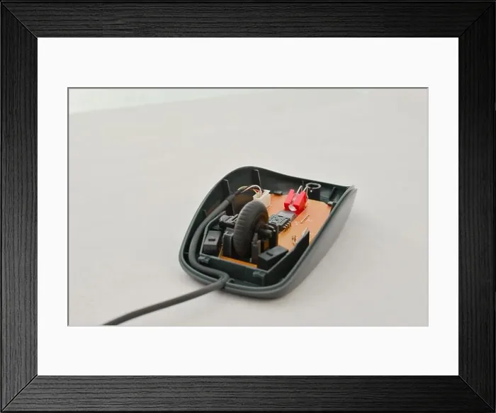 Framed Print : Open computer mouse with exposed electronic circuit for maintenance, symbol of technology and modern computing. Perfect for technology concepts, digit Framed Print : Open computer mouse with exposed electronic circuit for maintenance, symbol of technology and modern computing. Perfect for technology concepts, digit