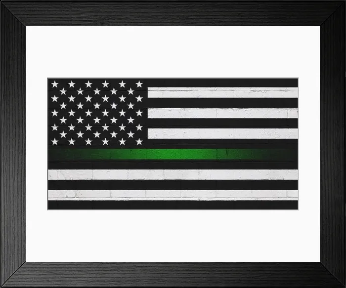 Framed Print : Border patrol thin green line flag painted on a cinder block wall Framed Print : Border patrol thin green line flag painted on a cinder block wall