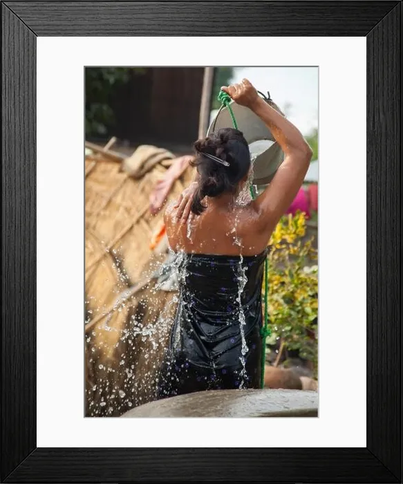 Framed Print : Woman bathing in small town well outside Bagan, Myanmar Framed Print : Woman bathing in small town well outside Bagan, Myanmar