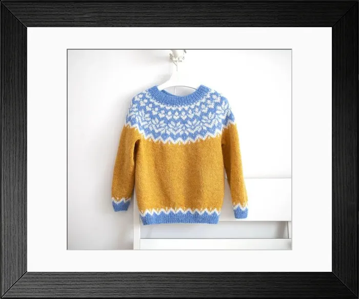 Framed Print : photo of an Icelandic knitted wool lopapeysa sweater, yellow blue white pullover with large colorful yoke in traditional Nordic knitting pattern hangi Framed Print : photo of an Icelandic knitted wool lopapeysa sweater, yellow blue white pullover with large colorful yoke in traditional Nordic knitting pattern hangi