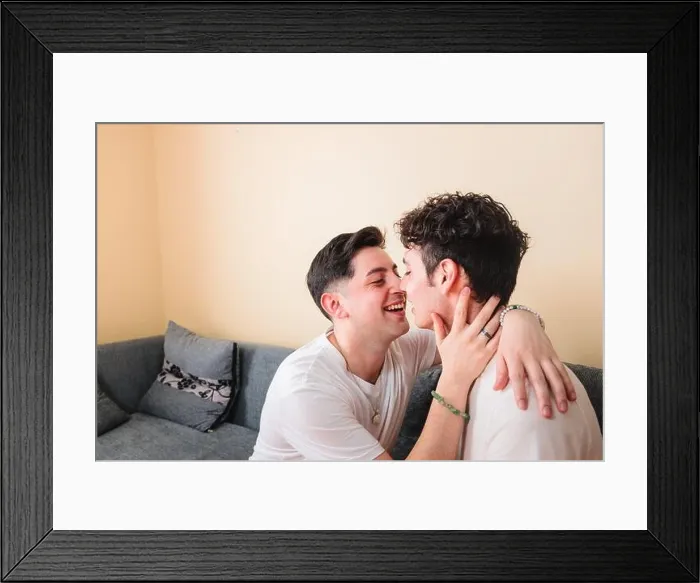 Framed Print : Homosexual men couple in pajamas kissing and touching each other. LGBT people daily life moments Framed Print : Homosexual men couple in pajamas kissing and touching each other. LGBT people daily life moments