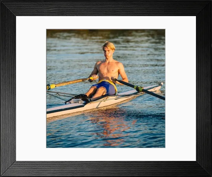Framed Print : Teenage boy sculling on water Framed Print : Teenage boy sculling on water