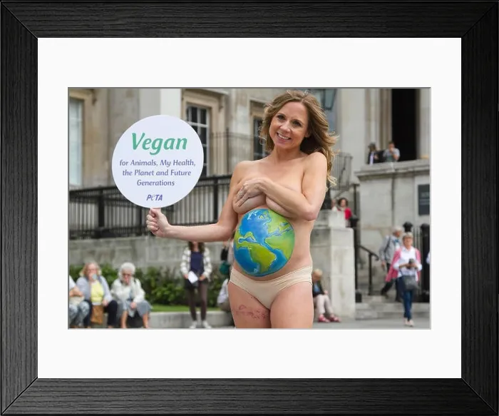 Framed Print : London UK. 30th July 2015. TV presenter Sarah-Jane Honeywell who is pregnant poses a mother earth with body paint on her belly to highlight