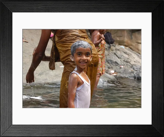 Framed Print : A girl washing at Rawana falls. Ella falls. (Ravana) Framed Print : A girl washing at Rawana falls. Ella falls. (Ravana)