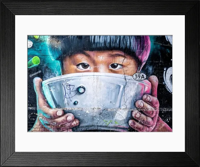 Framed Print : London England UK, 29 January 2022, Wall Art Or Graffiti Of Asian Child Drinking From A Soup Bowl Outside Wagamama Restaurant Bankside London Framed Print : London England UK, 29 January 2022, Wall Art Or Graffiti Of Asian Child Drinking From A Soup Bowl Outside Wagamama Restaurant Bankside London