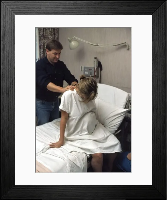 Framed Print : woman in labour labor receiving massage from partner Framed Print : woman in labour labor receiving massage from partner