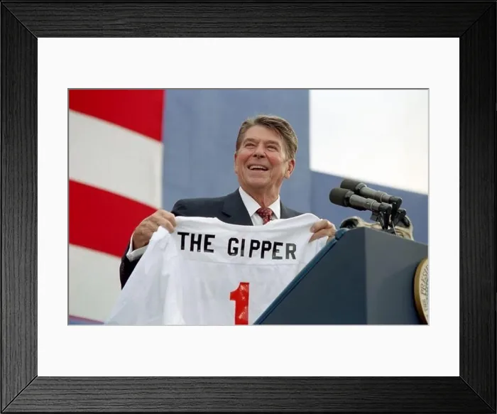 Framed Print : President Ronald Reagan holding The Gipper jersey at a campaign rally in Endicott, New York Framed Print : President Ronald Reagan holding The Gipper jersey at a campaign rally in Endicott, New York