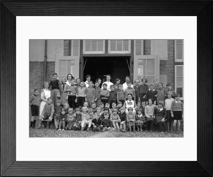Framed Print : Group portrait of the children and staff of the Restlingsoord Train 8.28 H.IJ.S.M. (Colonieweg) in Soest, with director Sister Edel in the middle row Framed Print : Group portrait of the children and staff of the Restlingsoord Train 8.28 H.IJ.S.M. (Colonieweg) in Soest, with director Sister Edel in the middle row