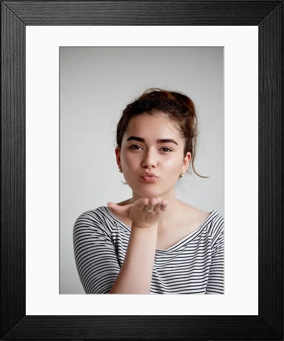 Framed Print : Cute lovely young woman standing and sending kiss over white background.Flying Kiss, Woman in Love Framed Print : Cute lovely young woman standing and sending kiss over white background.Flying Kiss, Woman in Love