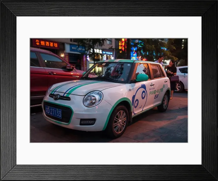 Framed Print : A Pand Auto Lifan 330 EV car sharing scheme electric vehicle parked on the side of the street in Chongqing, China Framed Print : A Pand Auto Lifan 330 EV car sharing scheme electric vehicle parked on the side of the street in Chongqing, China