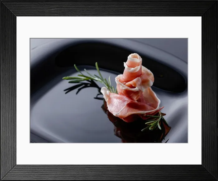 Framed Print : Prosciutto with rosemary on a black plate Framed Print : Prosciutto with rosemary on a black plate