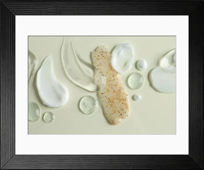 Framed Print : Smears of different cosmetic products on white background, flat lay Framed Print : Smears of different cosmetic products on white background, flat lay