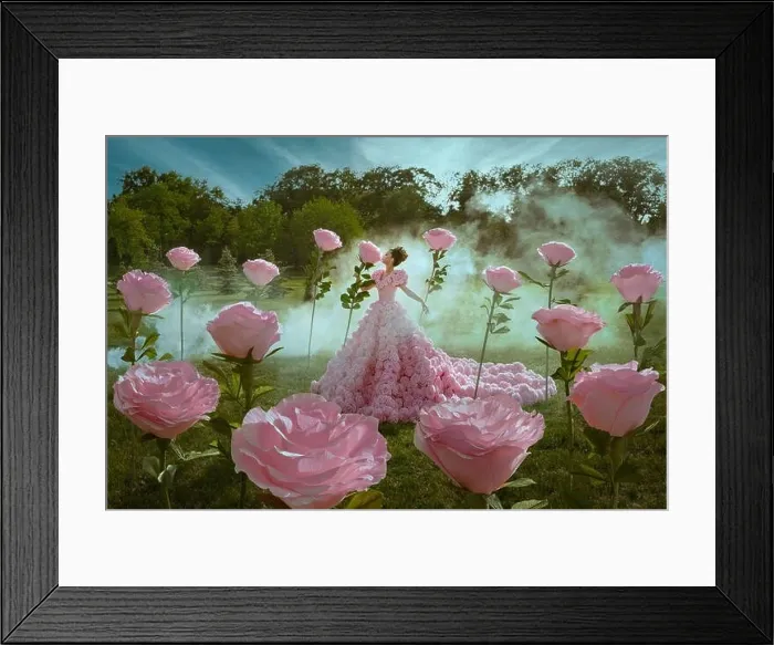 Framed Print : Beautiful woman in the dress of roses in the garden with giant roses Framed Print : Beautiful woman in the dress of roses in the garden with giant roses