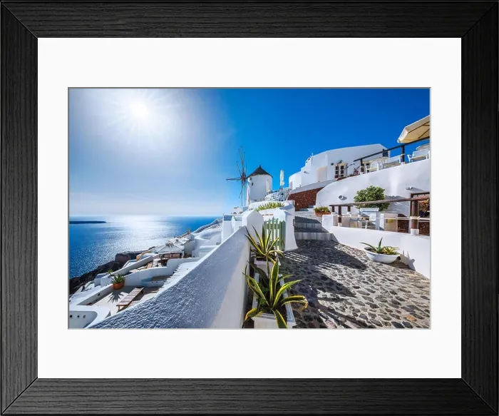 Framed Print : Oia village with sun, Santorini island, Greece Framed Print : Oia village with sun, Santorini island, Greece