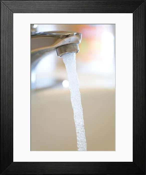 Framed Print : water Faucet / tap and Running Water close up shot Framed Print : water Faucet / tap and Running Water close up shot