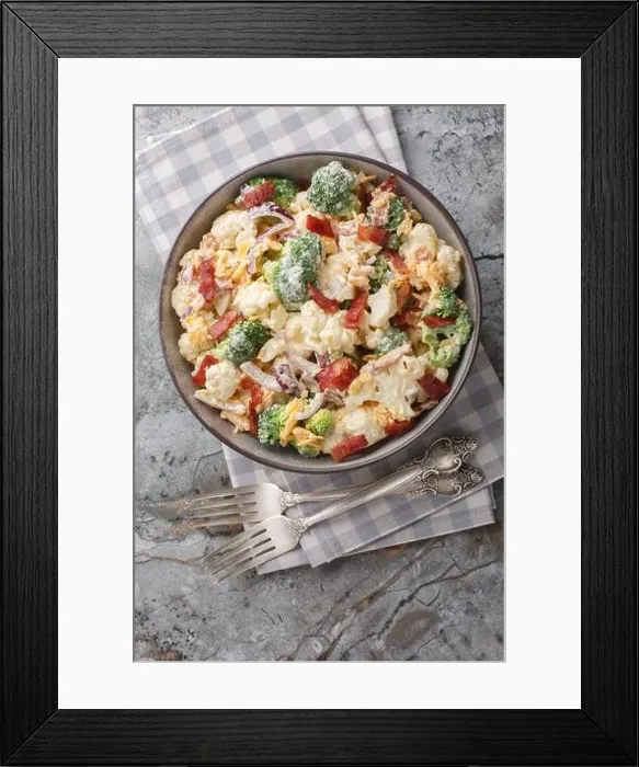 Framed Print : Broccoli cauliflower bacon bound salad with cheese mayonnaise dressing closeup on the plate on the table. Vertical top view from above Framed Print : Broccoli cauliflower bacon bound salad with cheese mayonnaise dressing closeup on the plate on the table. Vertical top view from above
