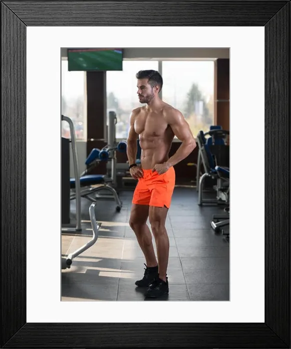 Framed Print : Young Man Standing Strong In The Gym And Flexing Muscles - Muscular Athletic Bodybuilder Fitness Model Posing After Exercises Framed Print : Young Man Standing Strong In The Gym And Flexing Muscles - Muscular Athletic Bodybuilder Fitness Model Posing After Exercises