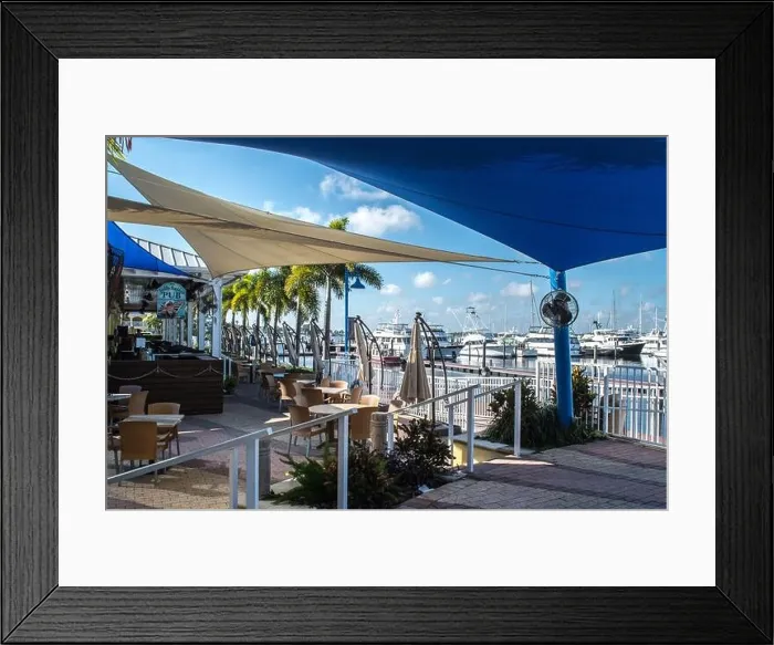 Framed Print : Downtown historic Stuart, FlorIda. Scenes along the streets with storefronts, restaurants and local hotels at the waterfront town in eastern Florida Framed Print : Downtown historic Stuart, FlorIda. Scenes along the streets with storefronts, restaurants and local hotels at the waterfront town in eastern Florida