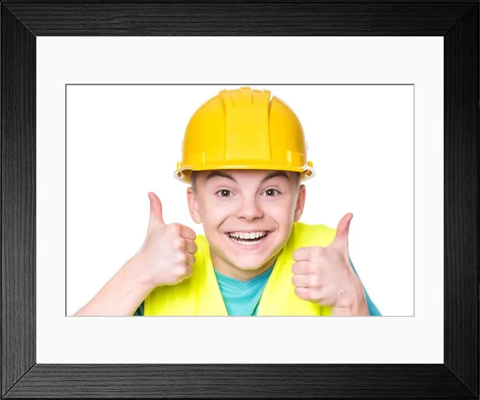 Framed Print : Boy wearing yellow hard hat Framed Print : Boy wearing yellow hard hat