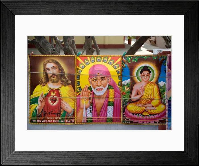 Framed Print : Posters of Jesus Christ, Shirdi Sai Baba and Lord Buddha Shakyamuni together on a stall in Sarnath, Uttar Pradesh, India Framed Print : Posters of Jesus Christ, Shirdi Sai Baba and Lord Buddha Shakyamuni together on a stall in Sarnath, Uttar Pradesh, India