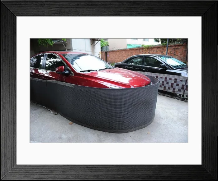 Framed Print : Cars are encircled by makeshift shields to prevent rats from invasion at a residential community in Nanning city, south China's Guangxi Zhuang Autonom Framed Print : Cars are encircled by makeshift shields to prevent rats from invasion at a residential community in Nanning city, south China's Guangxi Zhuang Autonom