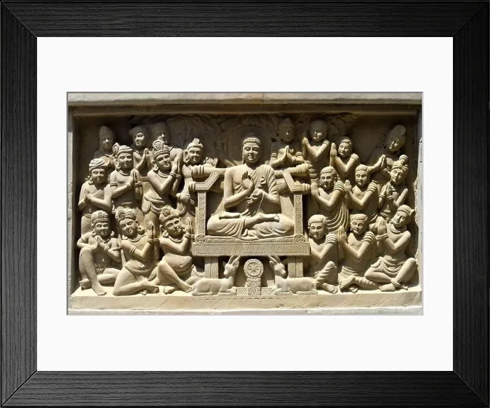 Framed Print : Close-up view of stone carving of Indian god Buddha on throne and being greeted by devotees Framed Print : Close-up view of stone carving of Indian god Buddha on throne and being greeted by devotees