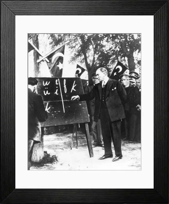 Framed Print : Kamel Ataturk points to Roman letters on a board, 1928 Framed Print : Kamel Ataturk points to Roman letters on a board, 1928