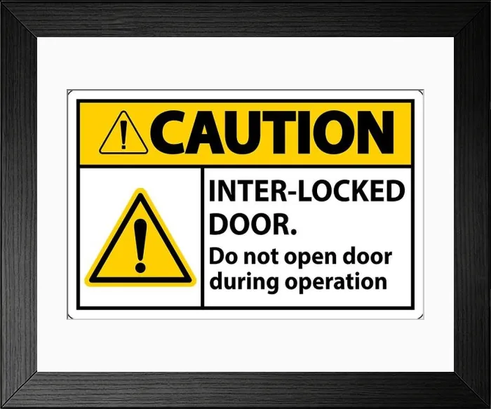 Framed Print : Safety sign caution Interlock doors do not open door during operation Framed Print : Safety sign caution Interlock doors do not open door during operation