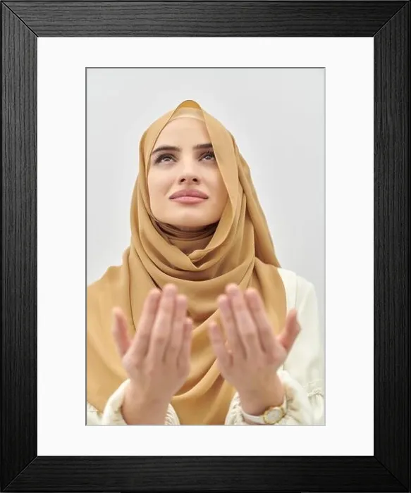 Framed Print : Portrait of young muslim woman making dua, praying to God