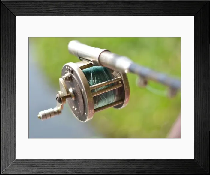 Framed Print : Close up of fishing rod wheel gear, selective focusing Framed Print : Close up of fishing rod wheel gear, selective focusing