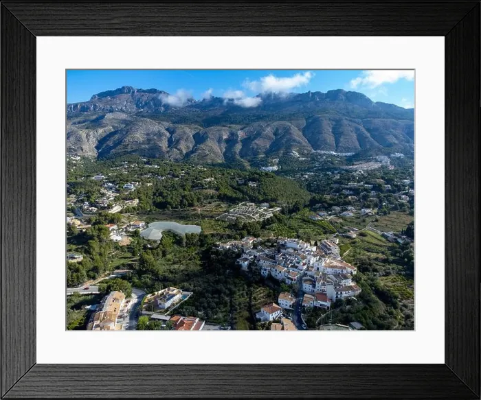 Framed Print : Aerial view of the village of Altea La Vella ( Altea La Vieja) in front of the Sierra Bernia mountain range near the town of Altea on the Costa Framed Print : Aerial view of the village of Altea La Vella ( Altea La Vieja) in front of the Sierra Bernia mountain range near the town of Altea on the Costa