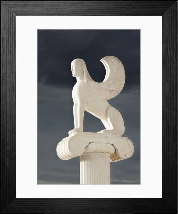 Framed Print : Greek Sphinx statue standing on top of a ionic order pillar on a cloudy day in Greece Framed Print : Greek Sphinx statue standing on top of a ionic order pillar on a cloudy day in Greece