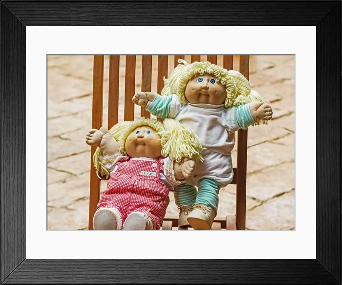 Framed Print : Original cabbage patch doll 70s, 80s on a wooden chair Framed Print : Original cabbage patch doll 70s, 80s on a wooden chair